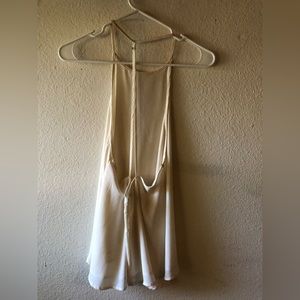 Shows back satin tank